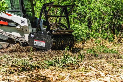 brush clearing equipment for skid steer|skid steer grinder attachment.